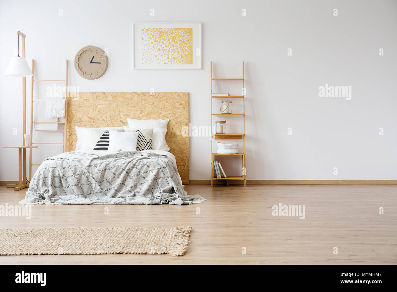Spacious Interior Of A Large Bedroom With Brown Rug Lying In