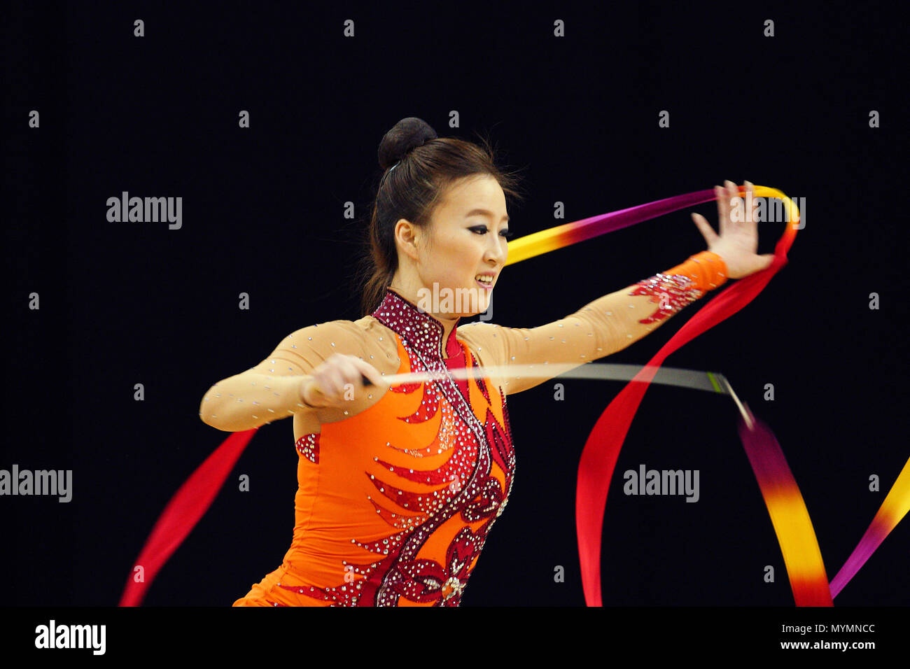 Visa Federation of International Gymnastics (FIG) - Yun Hee Gim of Korea performs with the Ribbon during the Women's Rhythmic Olympic qualification event at the O2 Arena London 17 January 2012 --- Image by © Paul Cunningham Stock Photo