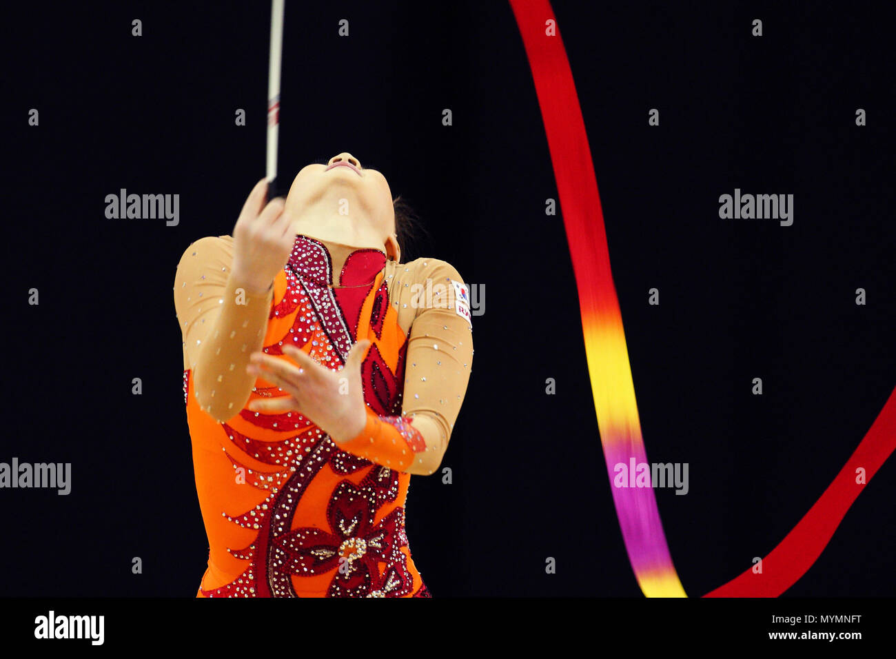 Visa Federation of International Gymnastics (FIG) - Yun Hee Gim of Korea performs with the Ribbon during the Women's Rhythmic Olympic qualification event at the O2 Arena London 17 January 2012 --- Image by © Paul Cunningham Stock Photo