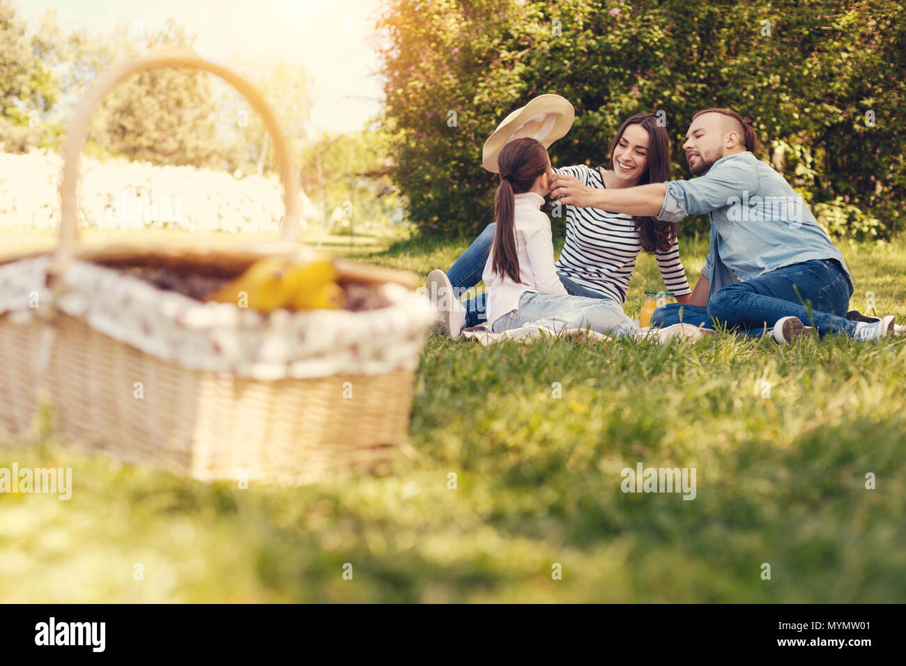 Happy joyful family enjoying their picnic Stock Photo - Alamy
