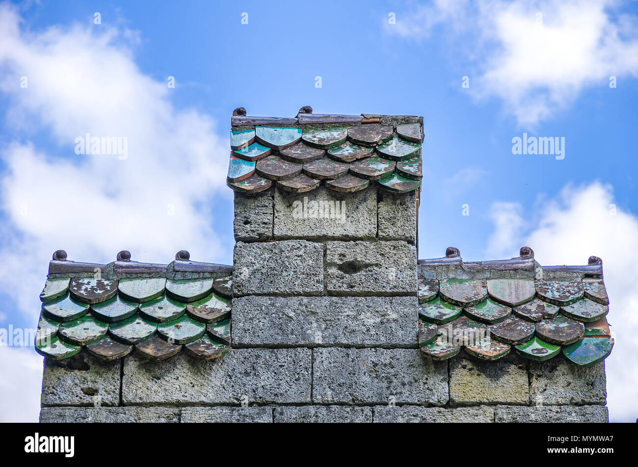 Crow-stepped gable with tiled roofs. Stock Photo