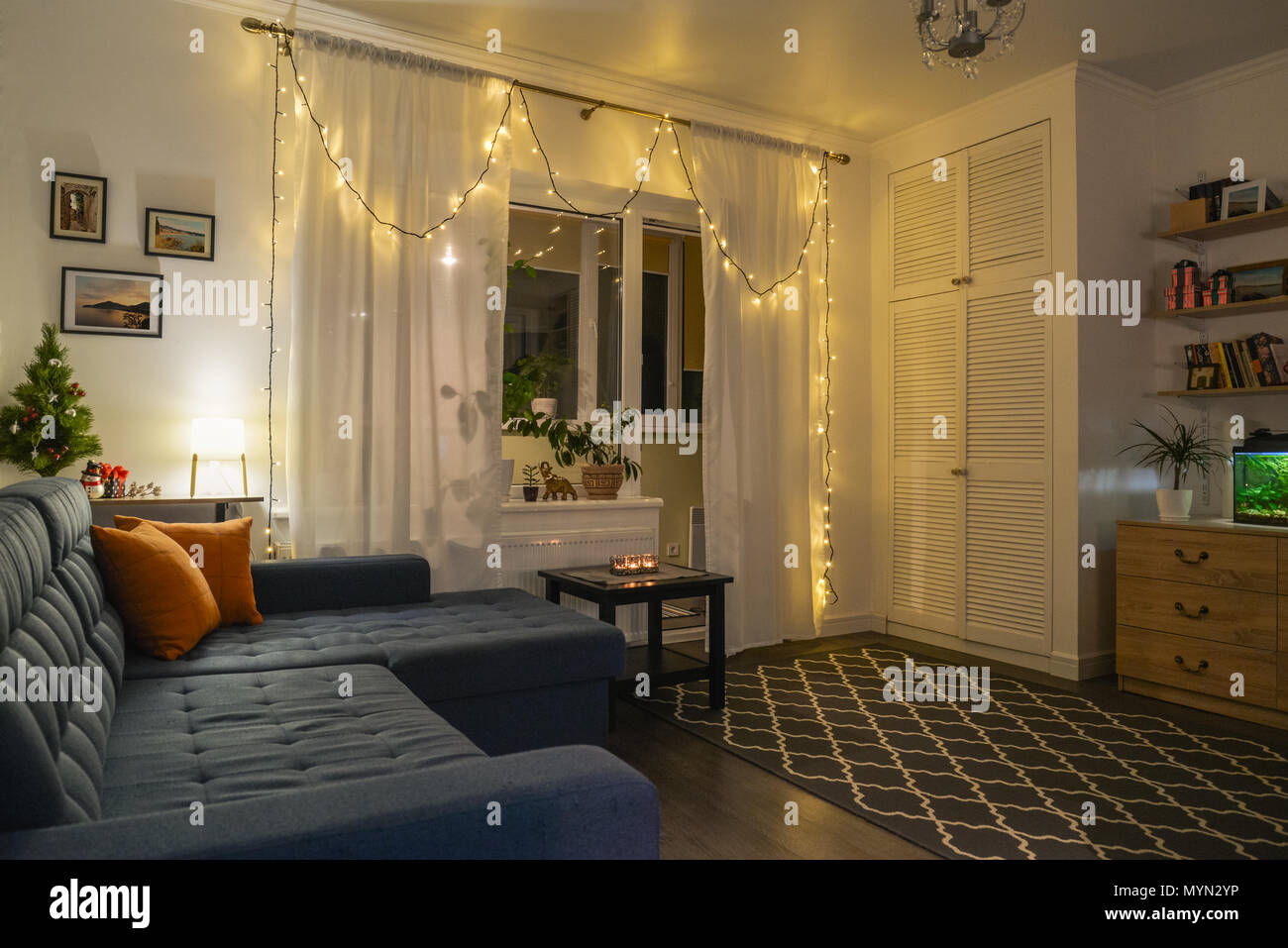 Beautiful Holdiay Decorated Room With Small Christmas Tree Table