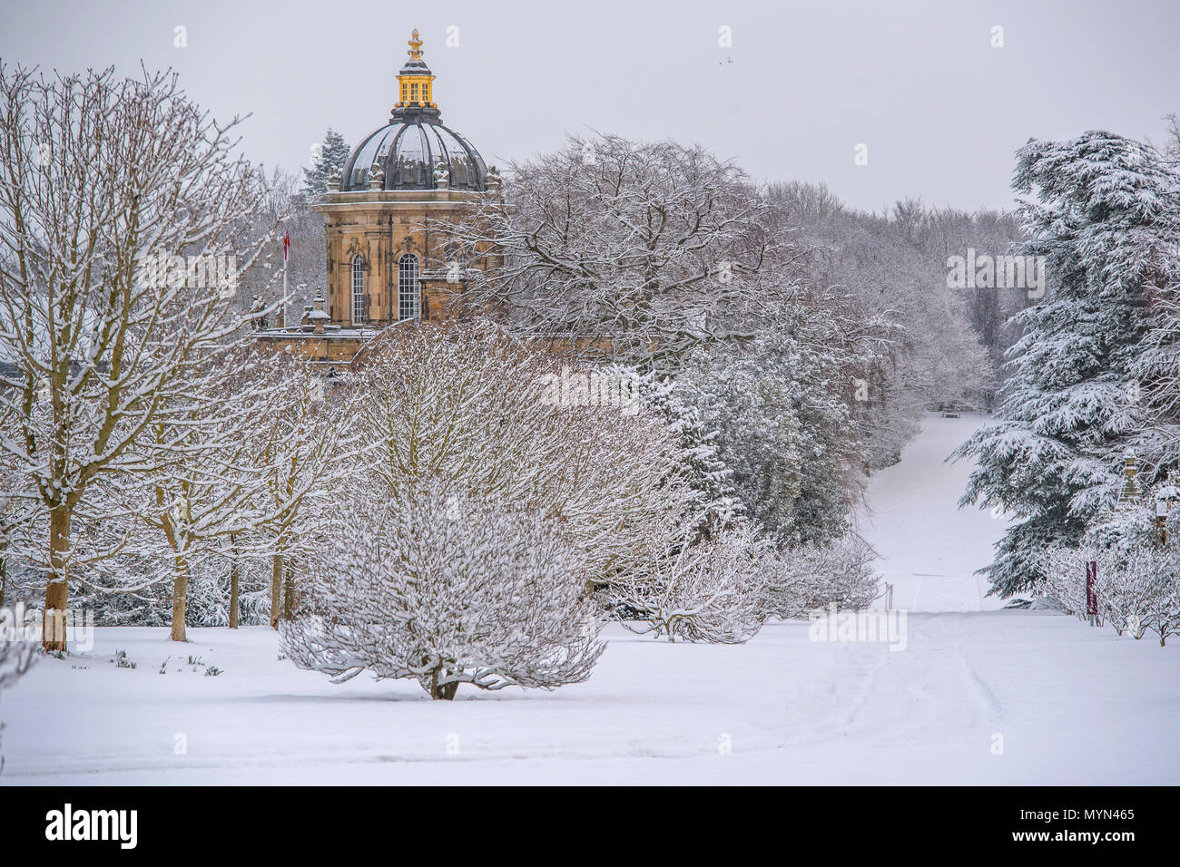 Castle Howard stately home                                                             as snow falls in Yorkshire Stock Photo