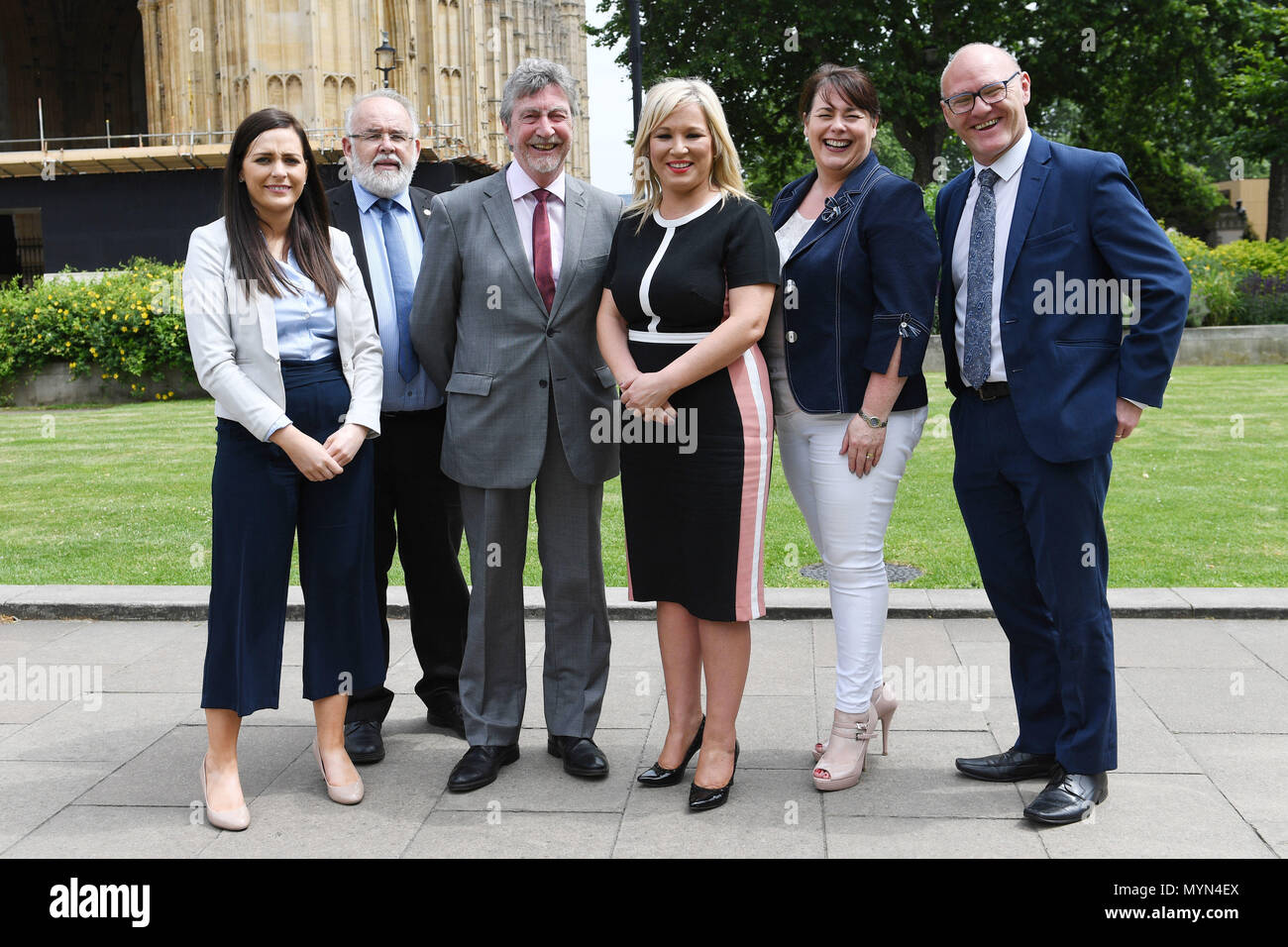 Sinn Fein leader Michelle O'Neill (third right) with the party's MPs, from left, Orfhlaith Begley, Francie Molloy, Mickey Brady, Michelle Gildernew and Paul Maskey in Westminster, central London, after the Supreme Court ruled that the Northern Ireland Human Rights Commission had no legal standing to bring its challenge against the abortion law. Stock Photo