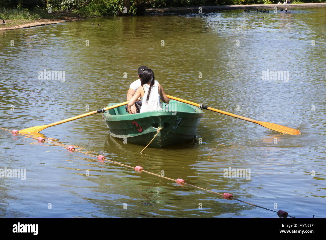 People enjoying in paddling boats in boating Lake at Alexandra Palace