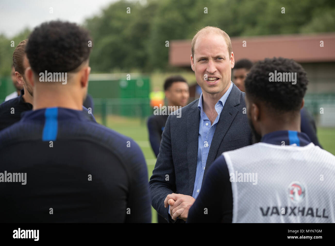 The Duke of Cambridge (centre) during a visit to the FA Training Ground to meet members of the England squad before their match at Elland Road in Leeds this Evening. Stock Photo
