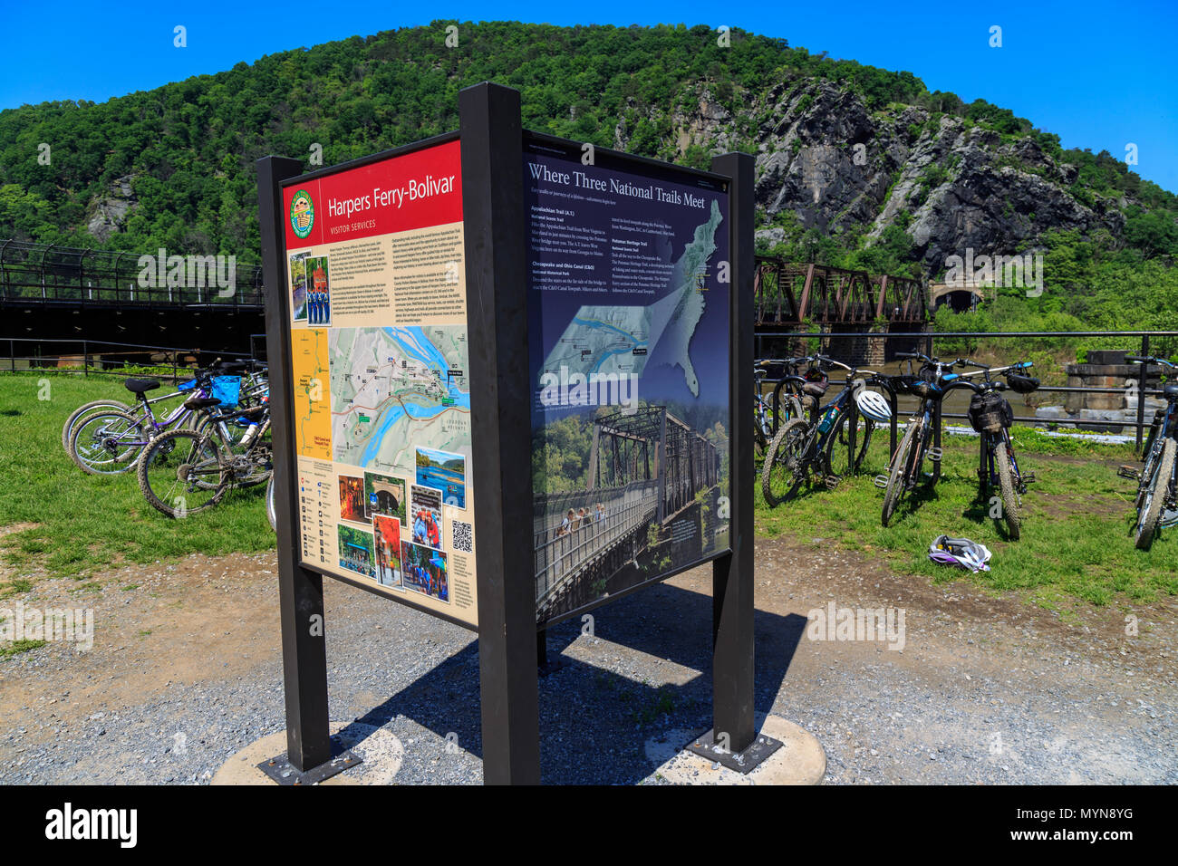 Harpers Ferry, WV, USA - May 24, 2018: A sign designating the intersecting American trails at the Harpers Ferry Bridge. Stock Photo