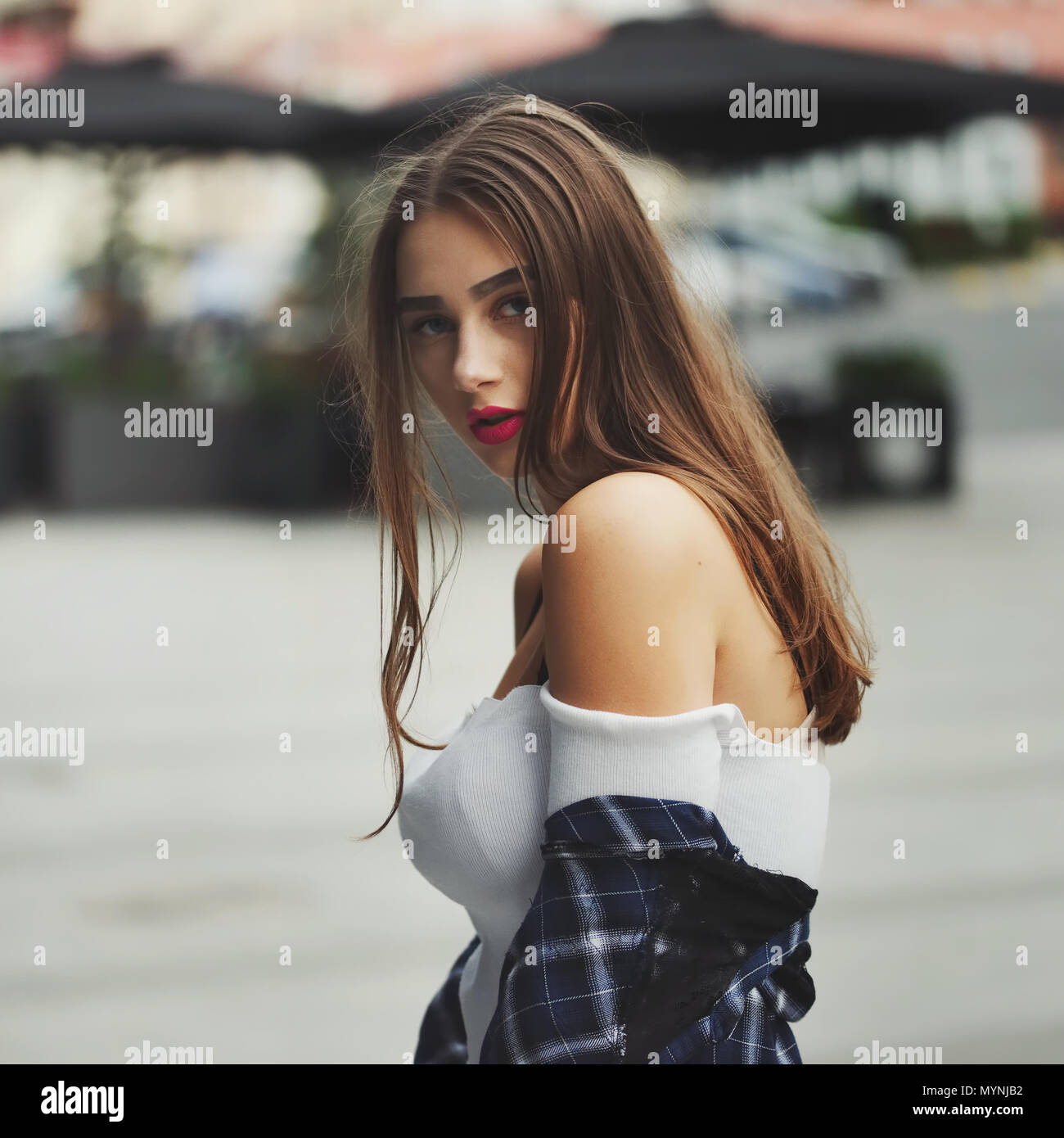 beautiful brunette girl on the street Stock Photo - Alamy
