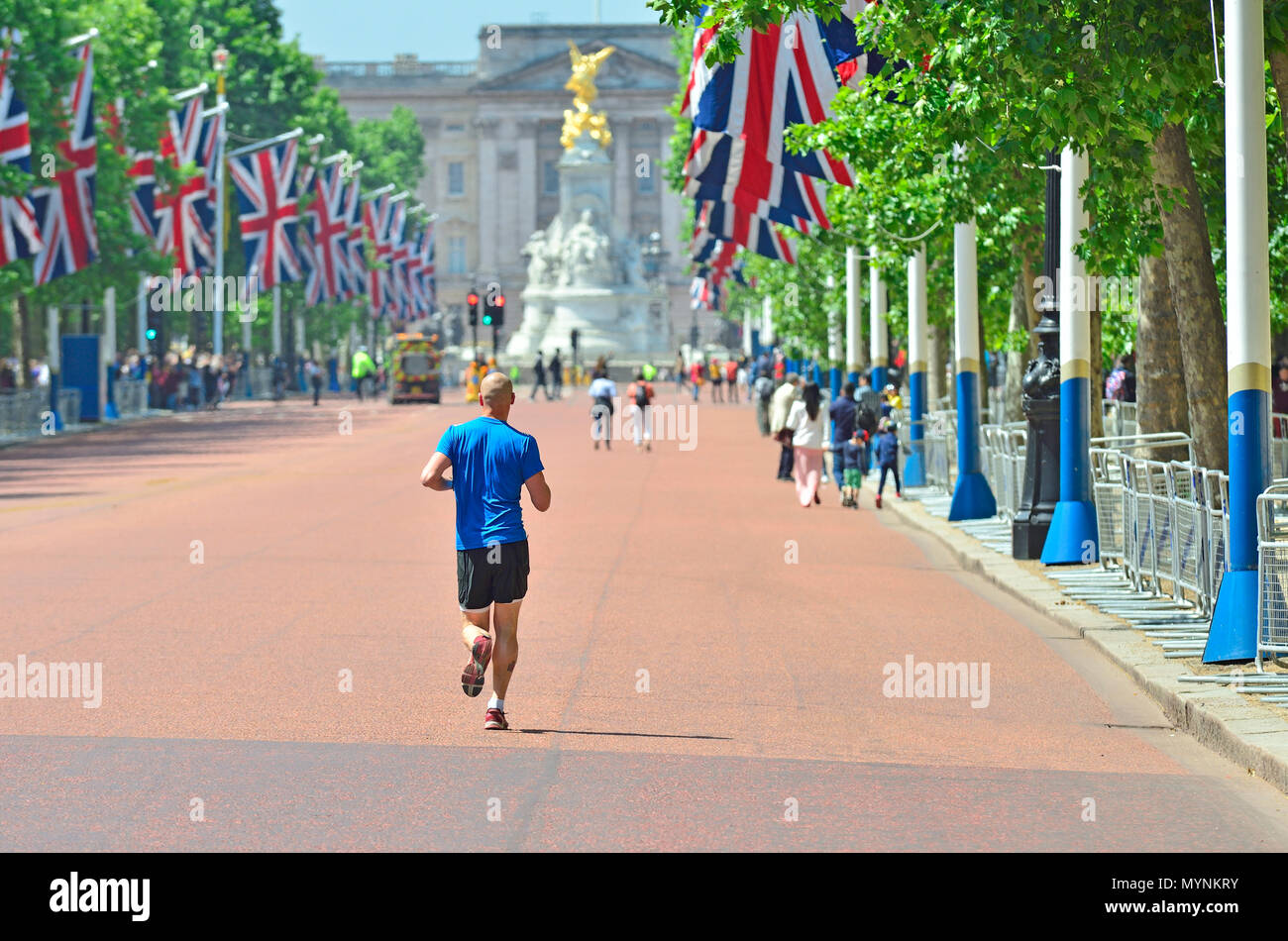 Man running in the Mall while it is closed to traffic. London, England, UK. Stock Photo
