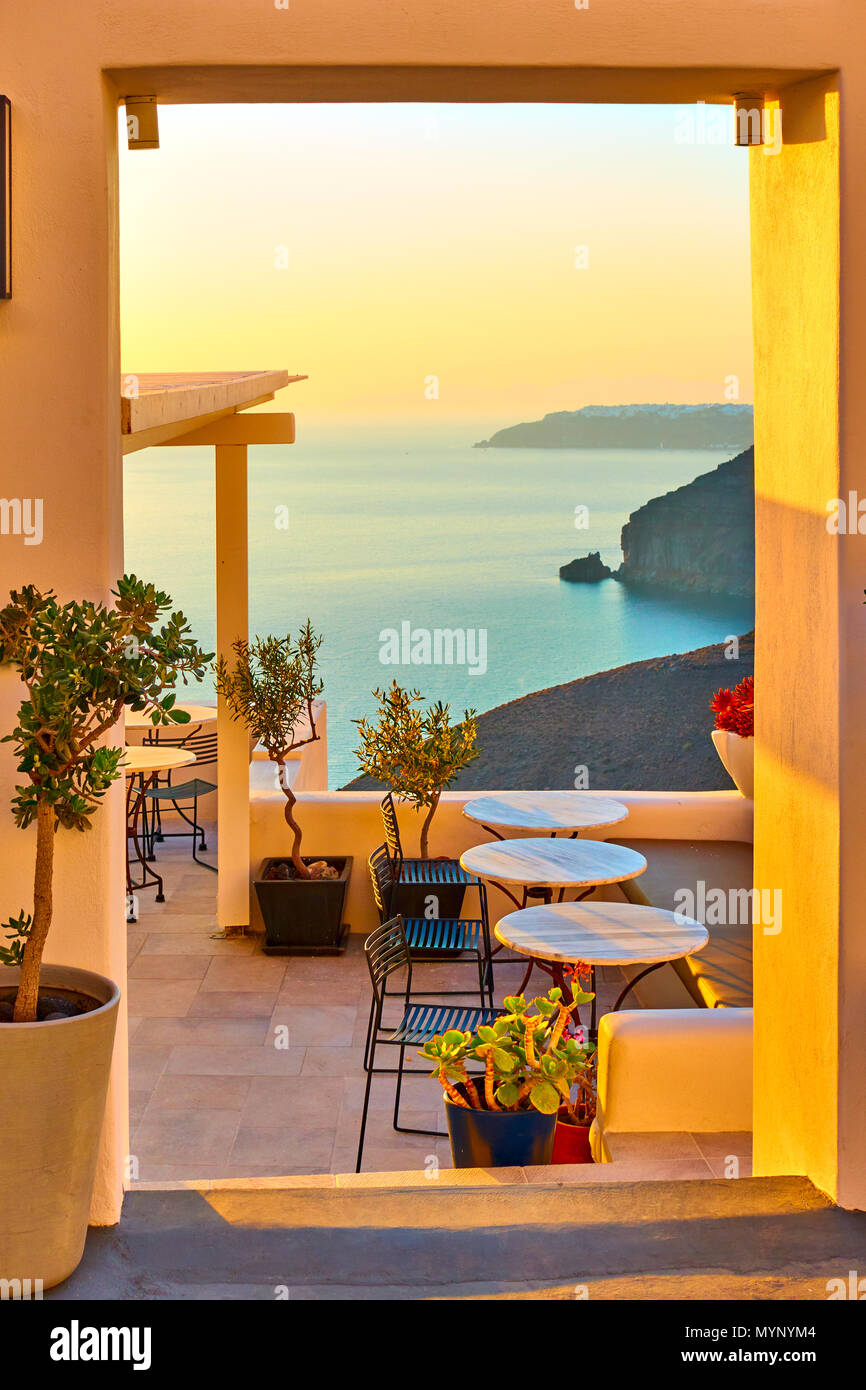 View of seashore through open door in Santorini Island, Greece Stock Photo