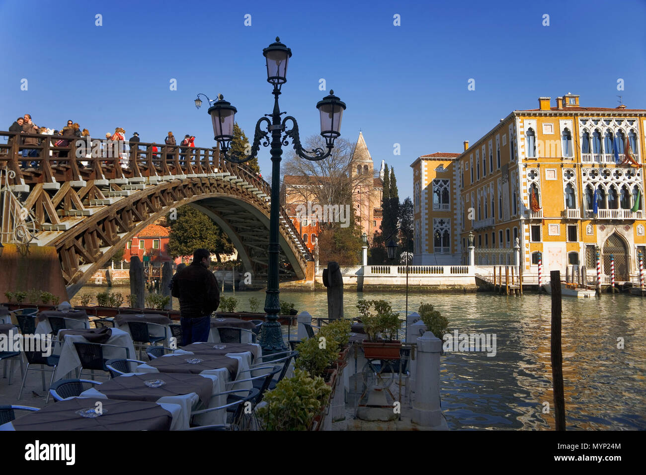 The wooden Ponte dell' Accademia over the Grand Canal and the Palazzo Cavelli-Franchetti, San Marco, Venice, Italy Stock Photo