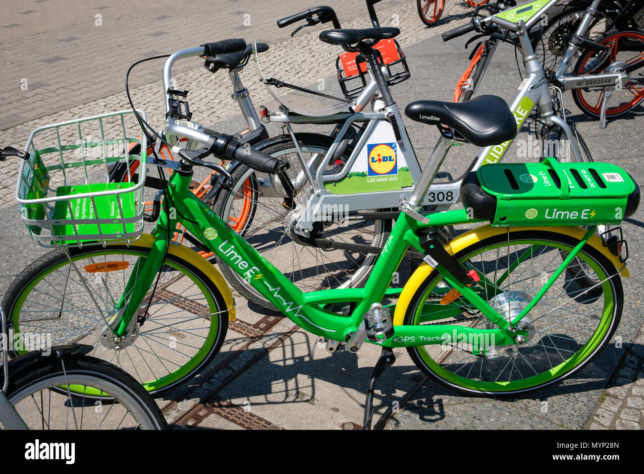 Berlin, Germany - june 2018: Many electric bicycles  of public bike sharing company LimeBike in Berlin, Germany Stock Photo