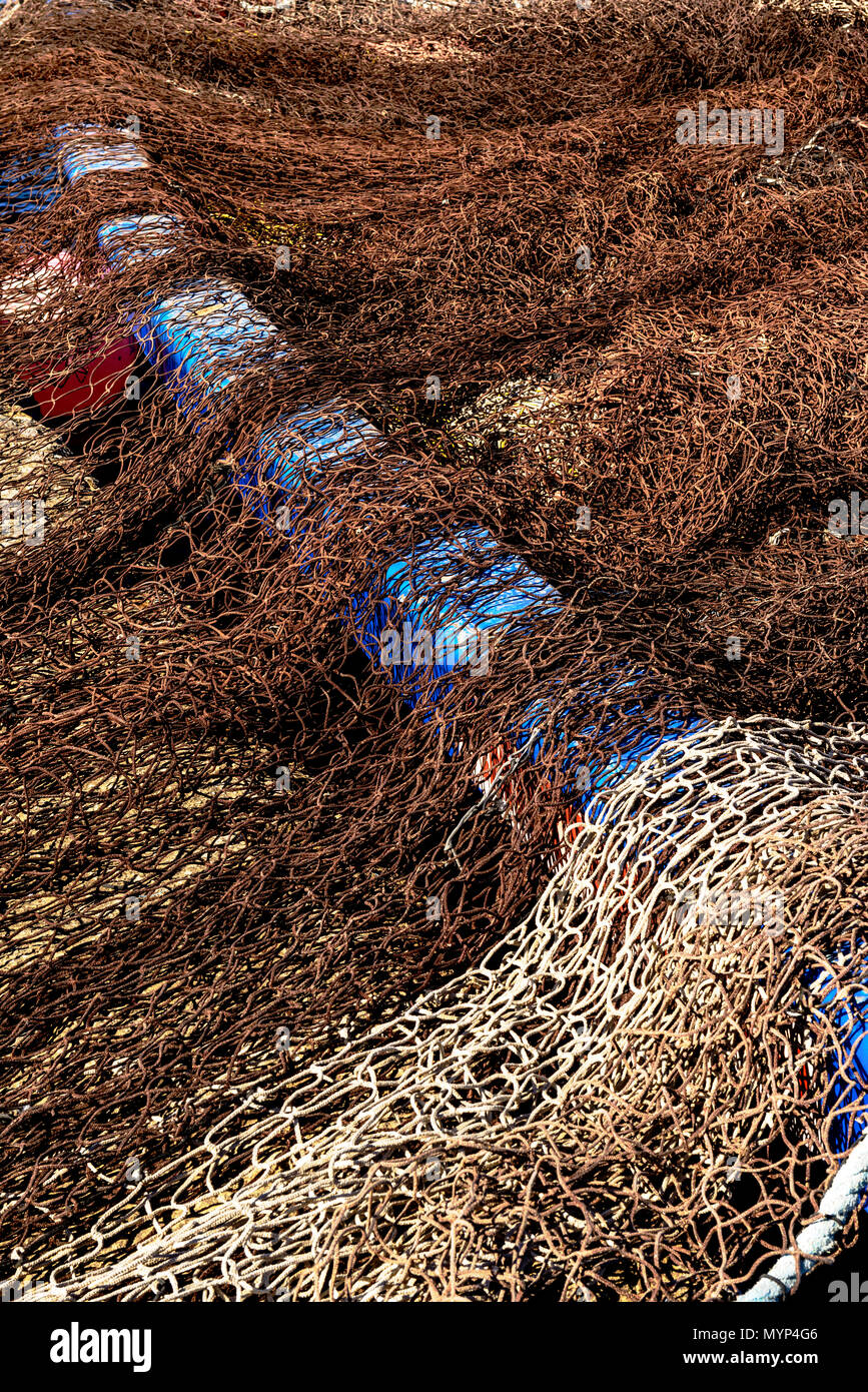 Fishing nets resting on the boat prepared for the slaughter of tuna on the high seas. Stock Photo