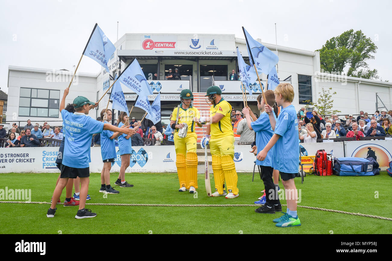 Australian opening batters D'Arcy Short (left) and Aaron Finch take to the field for the 50 over cricket tour match between Sussex and Australia at The 1st Central County Ground in Hove. 07 June 2018 Stock Photo