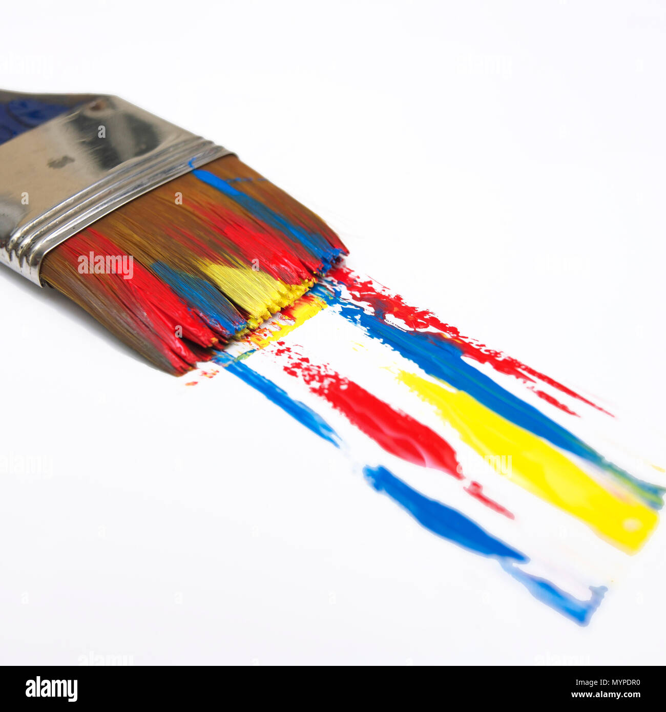 Paint brushe and multicolored painting Stock Photo
