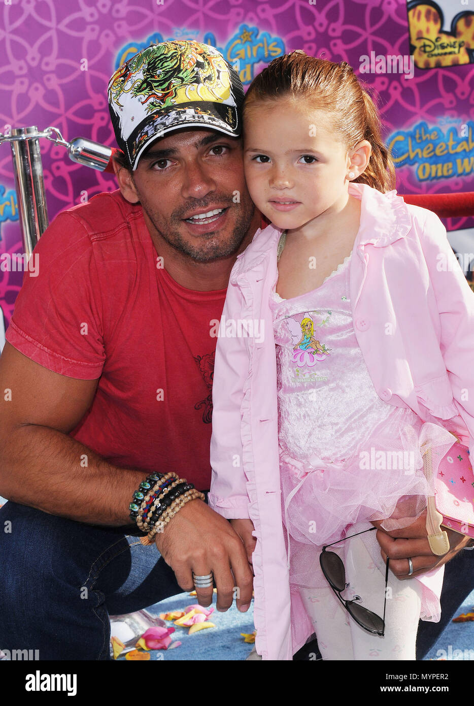 Cristian De La Fuente And Daughter Laura Cheetah Girls One World Premiere At The El Capitan Theatre In Los Angeles Eye Contact Smile04 Delafuentecristian Laura 04 Event In Hollywood Life