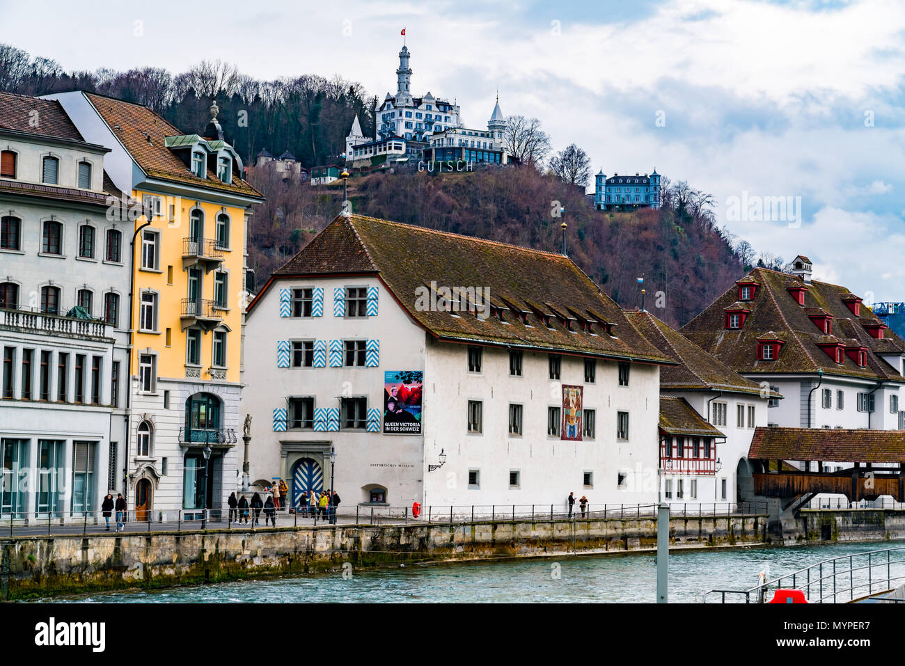 LUCERNE, SWITZERLAND - MARCH 30, 2018 :  View of the building in old city center with the Gutsch Castle in Lucerne Switzerland Stock Photo