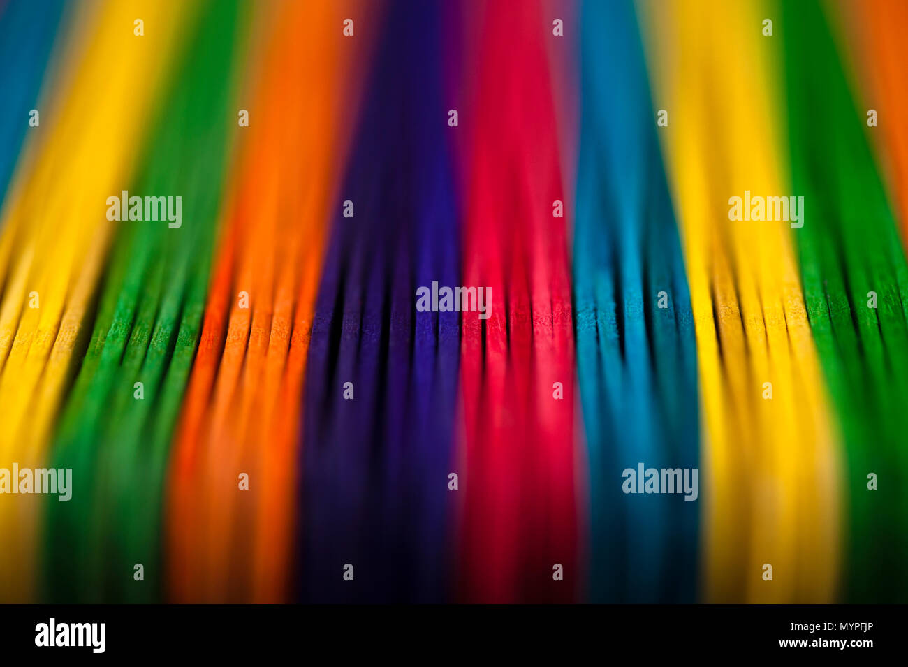 Close-up of multicolored sticks creating abstract patterns. Stock Photo