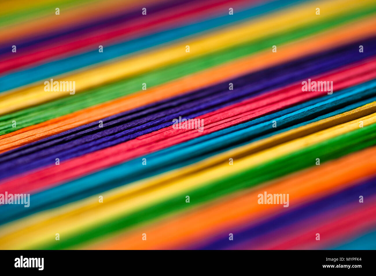Close-up of multicolored sticks creating abstract patterns. Stock Photo