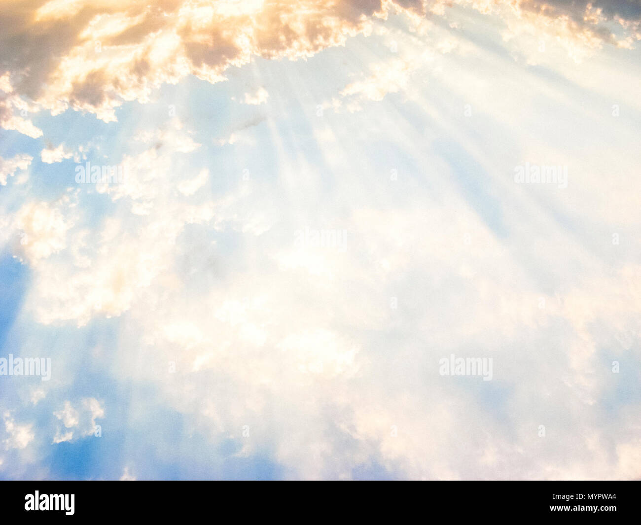 rays from golden clouds Stock Photo