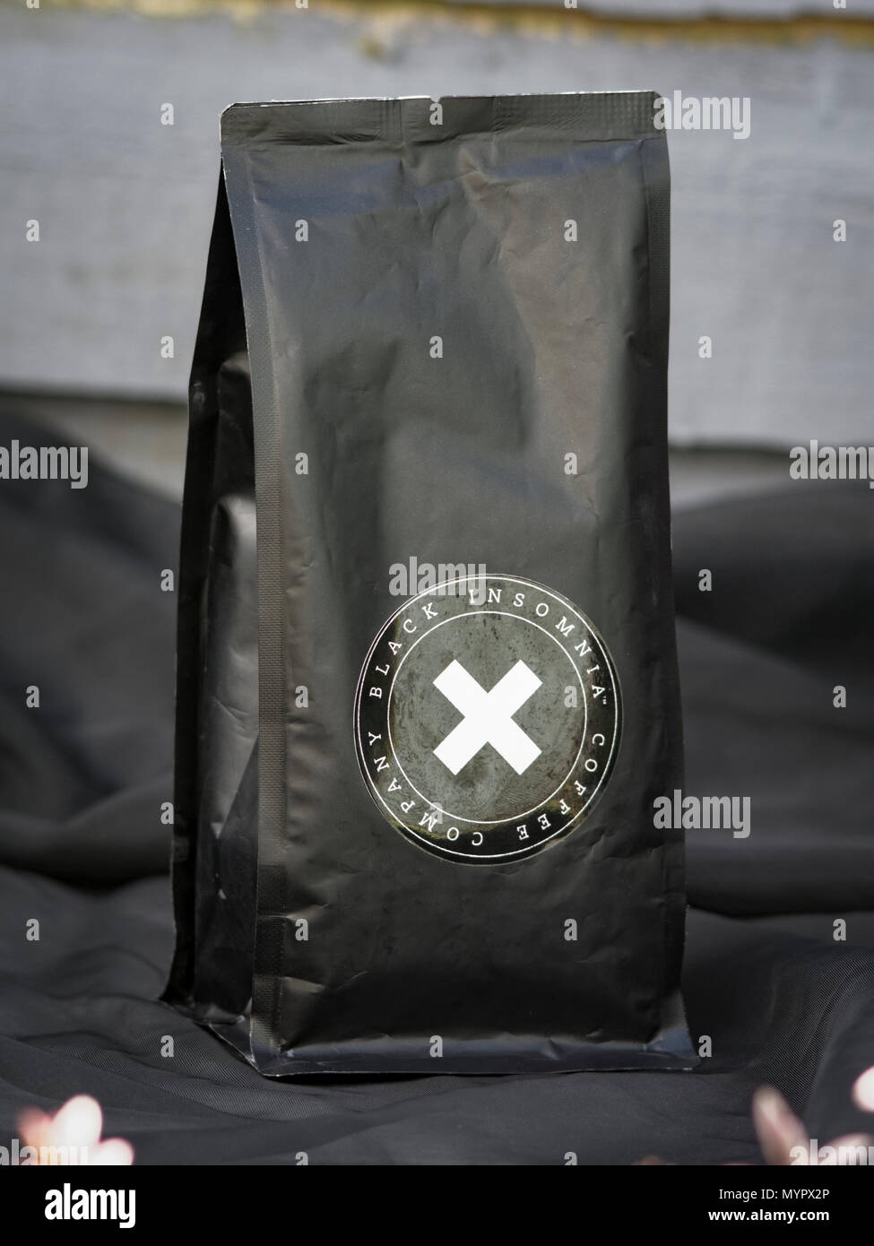 Black Insomnia Coffee Company, The World's Strongest Coffee contains 702 milligrams of caffeine per cup, Made in Delaware, USA Stock Photo