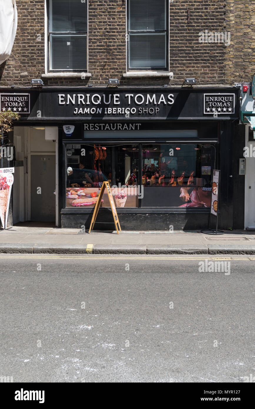 Enrique Tomás specialist Iberico Jamon ham shop and restaurant in Wardour Street, Soho, London, England, UK. Stock Photo