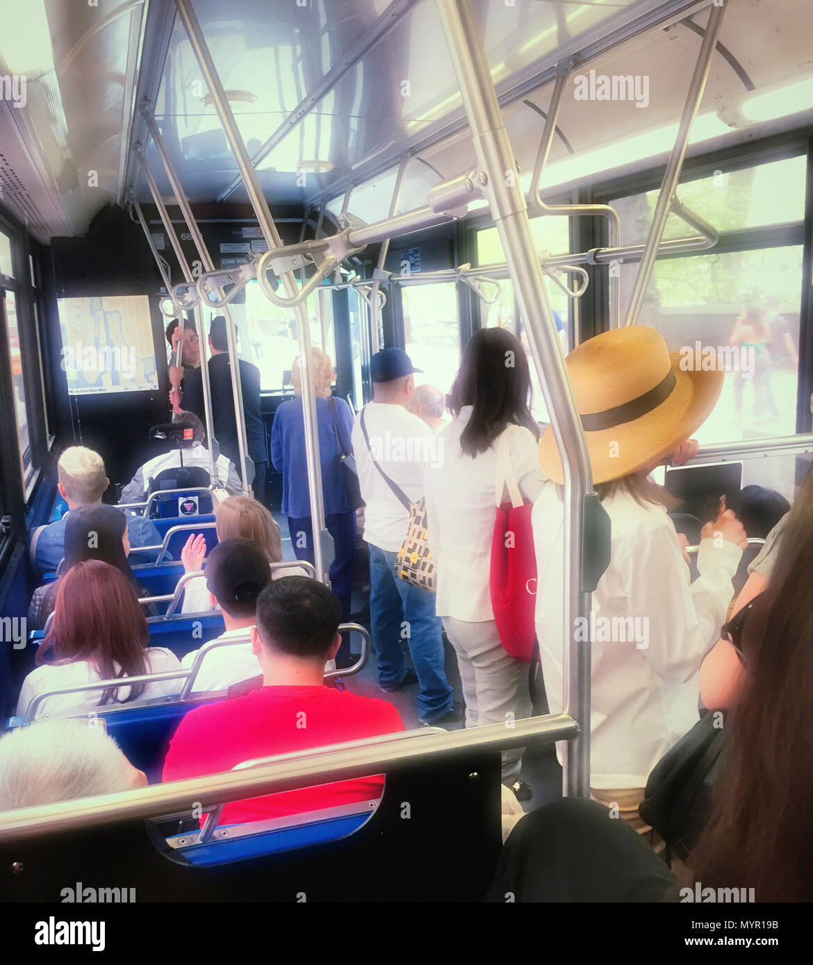 Passengers riding a New York City Bus, NYC, USA Stock Photo