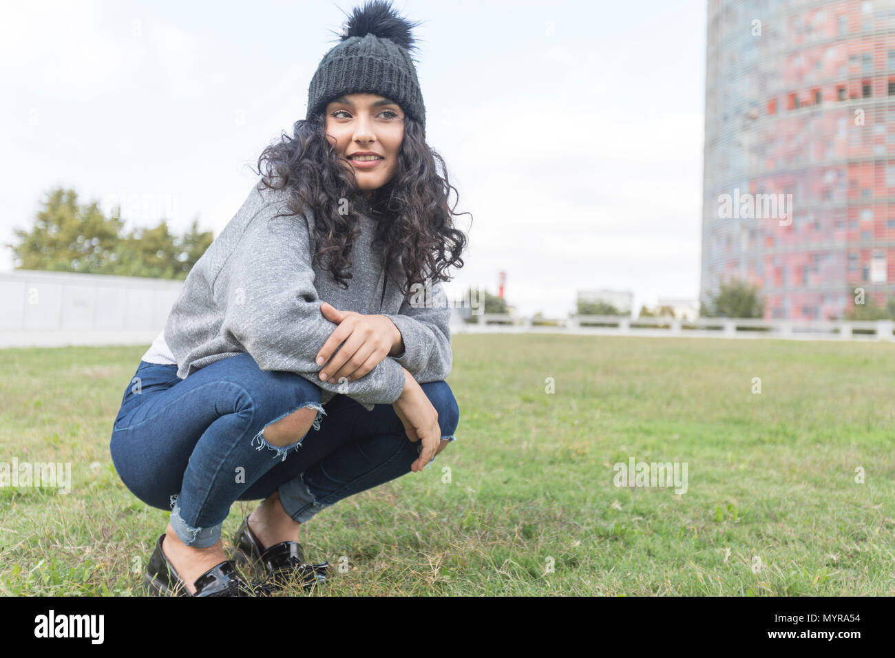 One young woman beach thinking wool hi-res stock photography and images ...