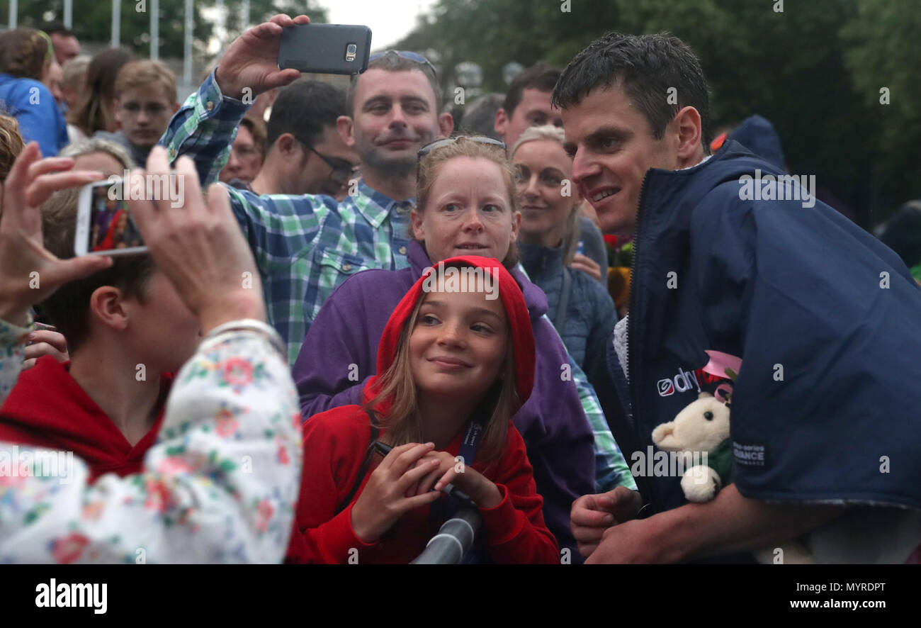 Team Great Britain's Jonathan Brownlee poses for a picture with fans after the 2018 Accenture World Triathlon Mixed Relay Event in Nottingham. Stock Photo