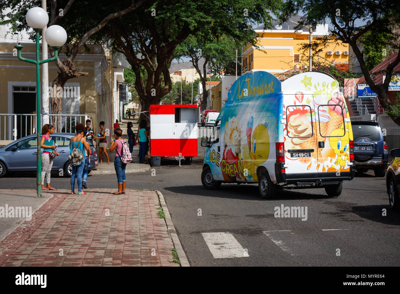 Ice Cream truck and people in the streets. Life in MINDELO, CAPE VERDE - DECEMBER 07, 2015 Stock Photo