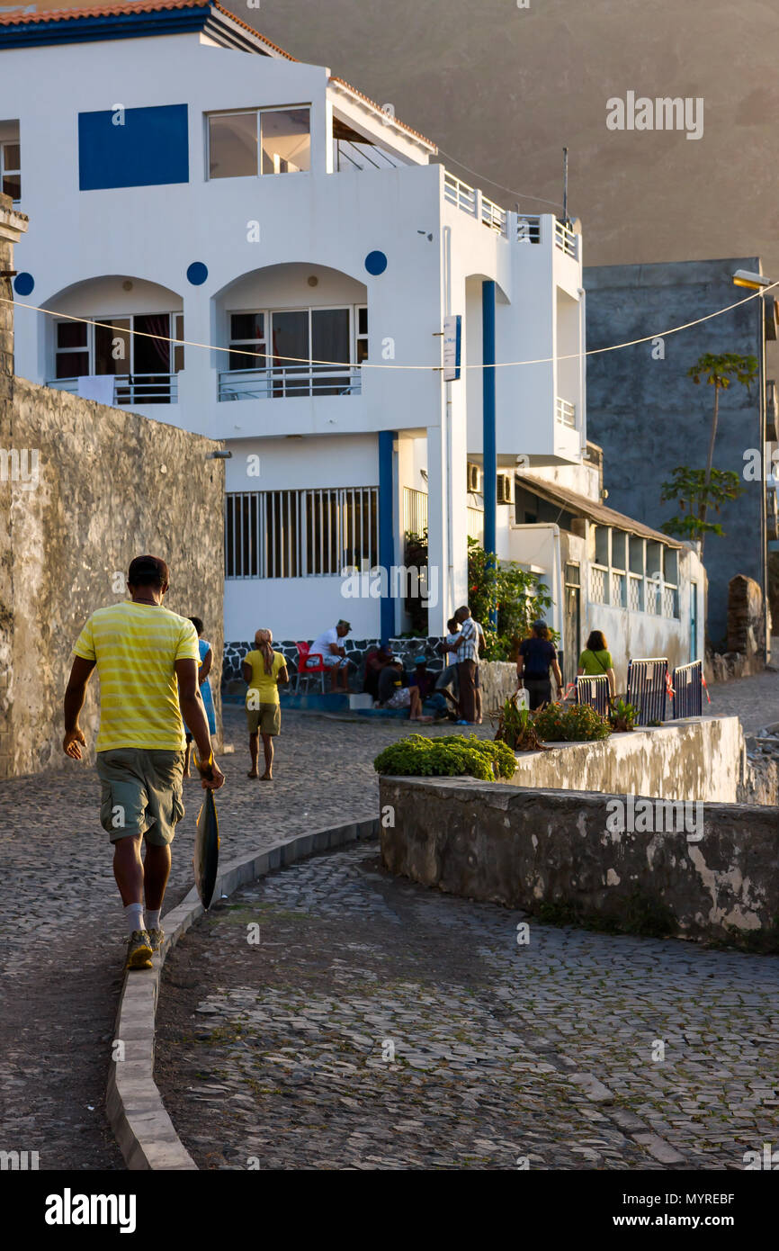 Man carrying a fresh fish bought from a fisherman. PONTA DO SOL, CAPE VERDE - DECEMBER 08, 2015 Stock Photo