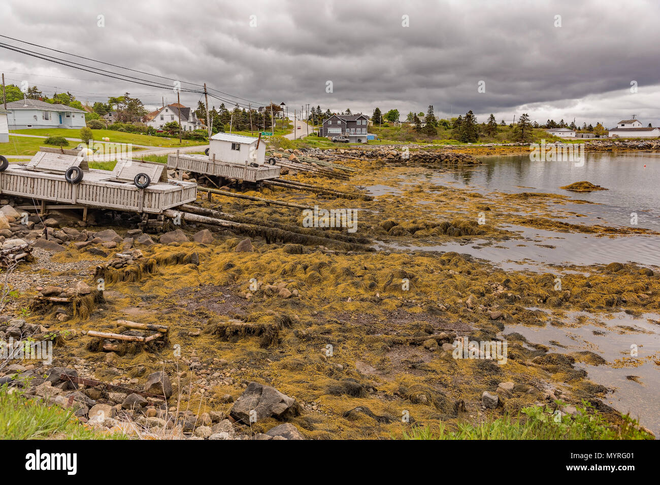 Docks on ramps in Shelburne harbour Nova Scotia coastline, Canada