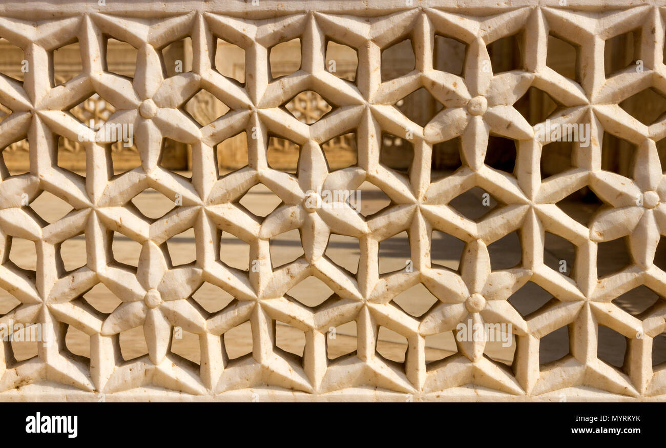 Hand-carved marble railing with geometric pattern of interlocking ...