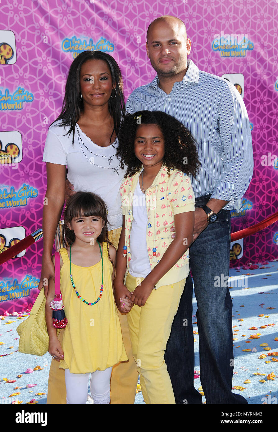 https://c8.alamy.com/comp/MYRNM3/mel-b-and-family-cheetah-girls-one-world-premiere-at-the-el-capitan-theatre-in-los-angeles-three-quarters-eye-contact-smile15-melb-family-15-event-in-hollywood-life-california-red-carpet-event-usa-film-industry-celebrities-photography-bestof-arts-culture-and-entertainment-celebrities-fashion-best-of-hollywood-life-event-in-hollywood-life-california-red-carpet-and-backstage-music-celebrities-topix-couple-family-husband-and-wife-and-kids-children-brothers-and-sisters-inquiry-tsuni@gamma-usacom-credit-tsuni-usa-2006-to-2009-MYRNM3.jpg