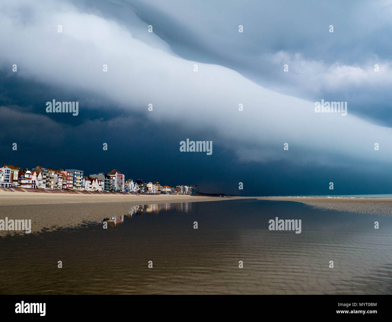 A thunderstorm approaching the beachfront buildings in Bray-Dunes in northern France Stock Photo