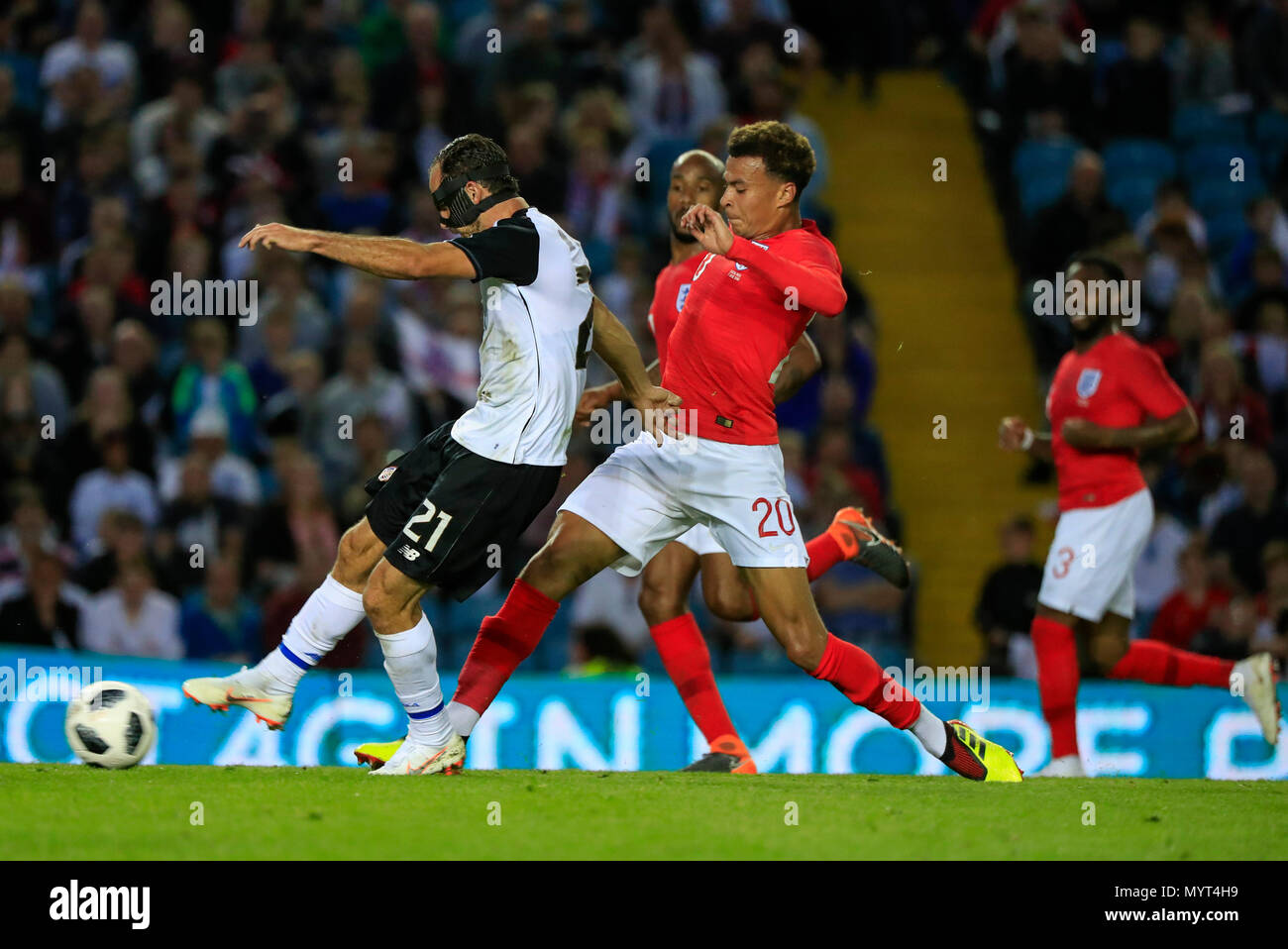 Elland Road, Leeds, UK. 7th June, 2018. International football friendly, England versus Costa Rica; Dele Alli of England challenges Marcos Urena of Costa Rica Credit: Action Plus Sports/Alamy Live News Stock Photo