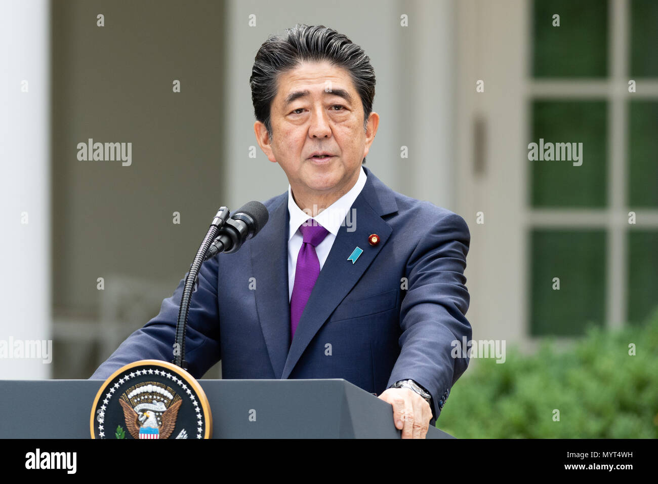 Shinzo Abe, the Prime Minister of Japan, in the Rose Garden at the White House. US President Donald Trump and Japan's Prime Minister Shinzo Abe take part in a joint press conference in the Rose Garden of the White House. Stock Photo