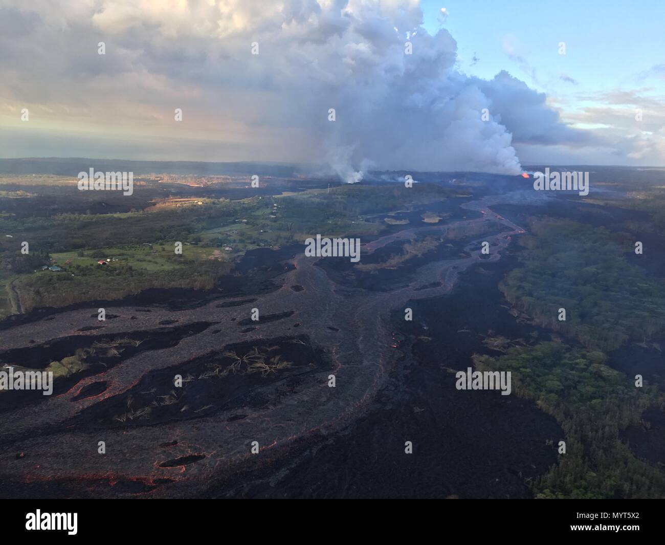 Hawaii, USA. 6th June, 2018. A massive lava fountain spewing magma 150 feet into the air from fissure 8 at the corner of Nohea and Leilani caused by the eruption of the Kilauea volcano June 6, 2018 in Hawaii. The recent eruption continues destroying homes, forcing evacuations and spewing lava and poison gas on the Big Island of Hawaii. Credit: Planetpix/Alamy Live News Stock Photo