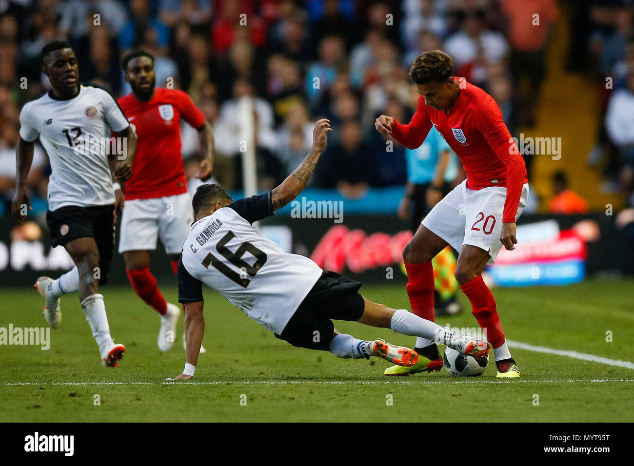 Leeds, UK. 7th Jun, 2018. Dele Alli of England is tackled by Cristian Gamboa of Costa Rica during the International Friendly match between England and Costa Rica at Elland Road on June 7th 2018 in Leeds, England. (Photo by Daniel Chesterton/phcimages) Credit: PHC Images/Alamy Live News Stock Photo
