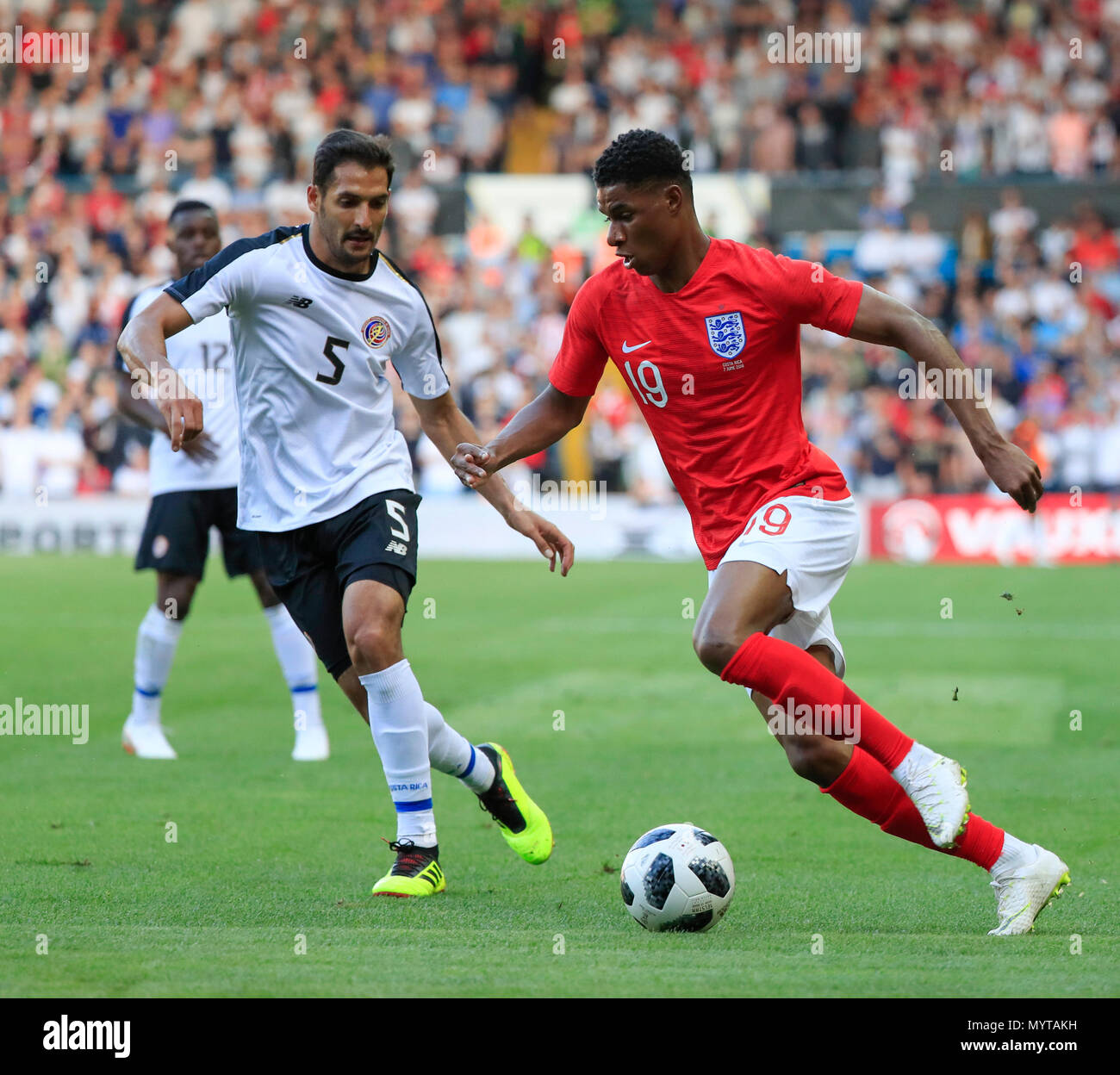 Elland Road, Leeds, UK. 7th June, 2018. International football friendly, England versus Costa Rica; Marcus Rashford of England tries to run past Celso Borges of Costa Rica Credit: Action Plus Sports/Alamy Live News Stock Photo