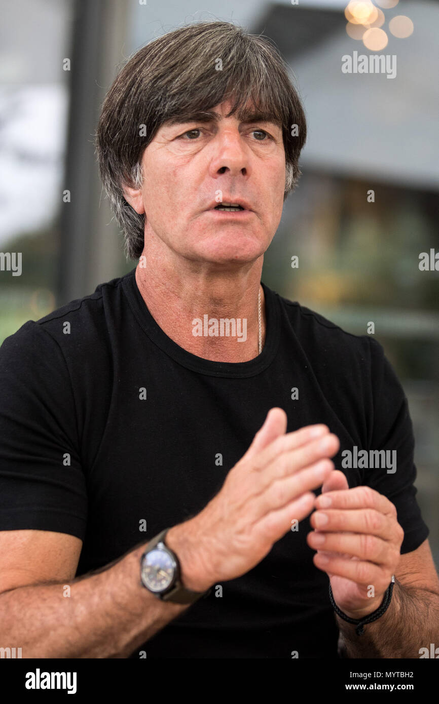07 June 2018, Italy, Eppan: Soccer, national squad, Germany, training camp ahead of the soccer World Cup Russia 2018. Germany head coach Joachim Loew speaking to dpa during an interview by the pool in the squad's hotel 'Weinegg'. Photo: Christian Charisius/dpa Stock Photo