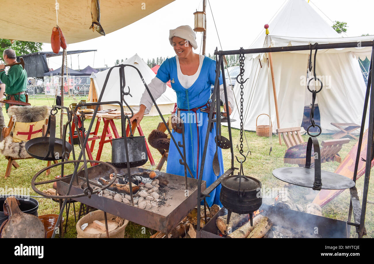 Ardingly Sussex UK 8th June 2018 - Sian Bailey from the Hartley Companie , a medieval reenactment group at the South of England Show in beautiful sunny weather held at the Ardingly Showground near Haywards Heath Sussex Credit: Simon Dack/Alamy Live News Stock Photo