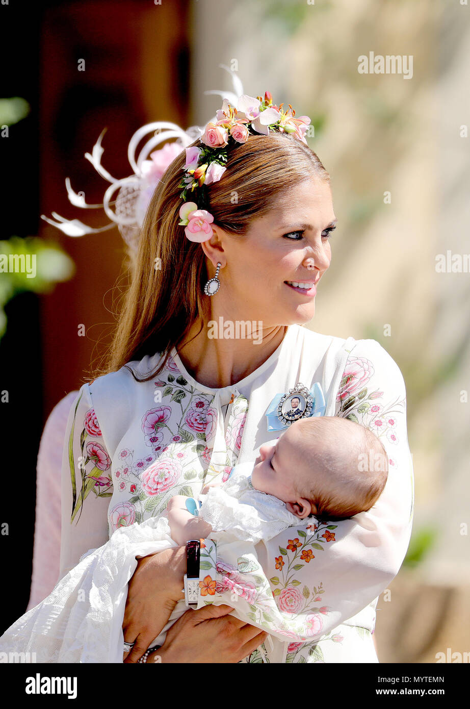 Princess Madeleine and Princess Adrienne of Sweden posing for the press