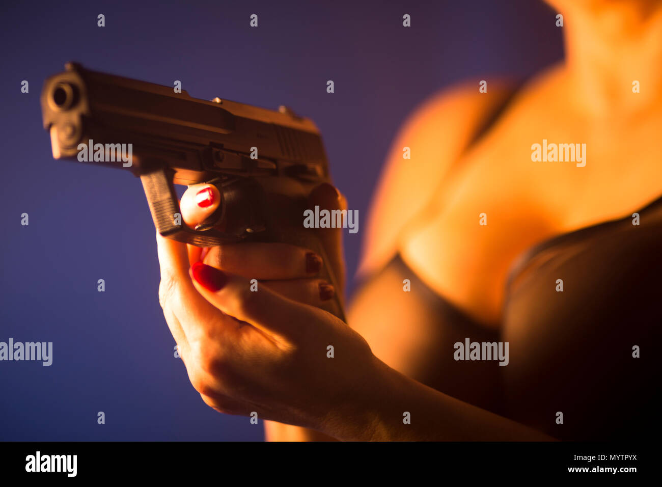 Sexy very big breasts busty lady with automatic pistol gun in erotic lingerie  underwear Stock Photo - Alamy