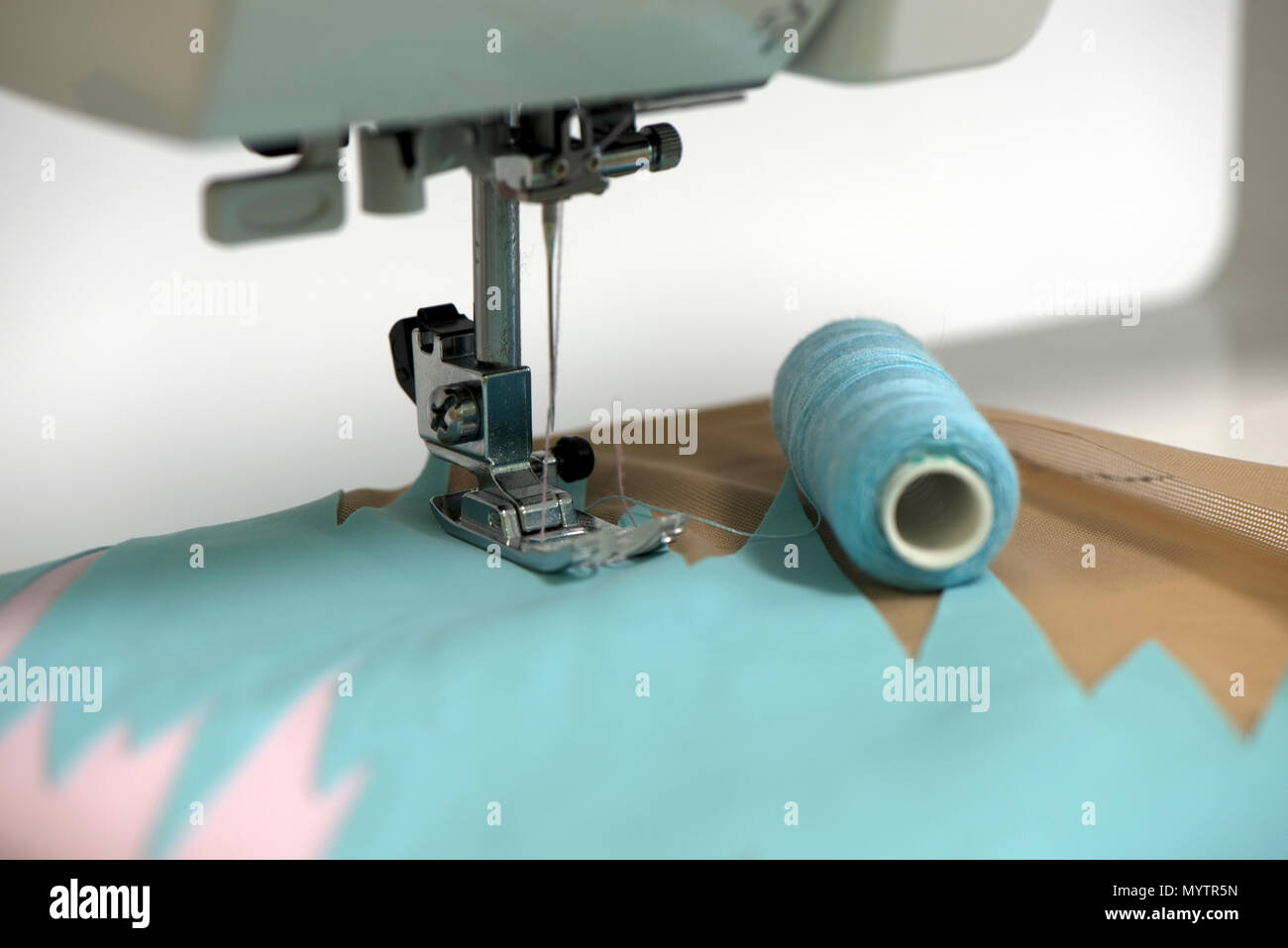 strings of a needle sewing machine Stock Photo Alamy