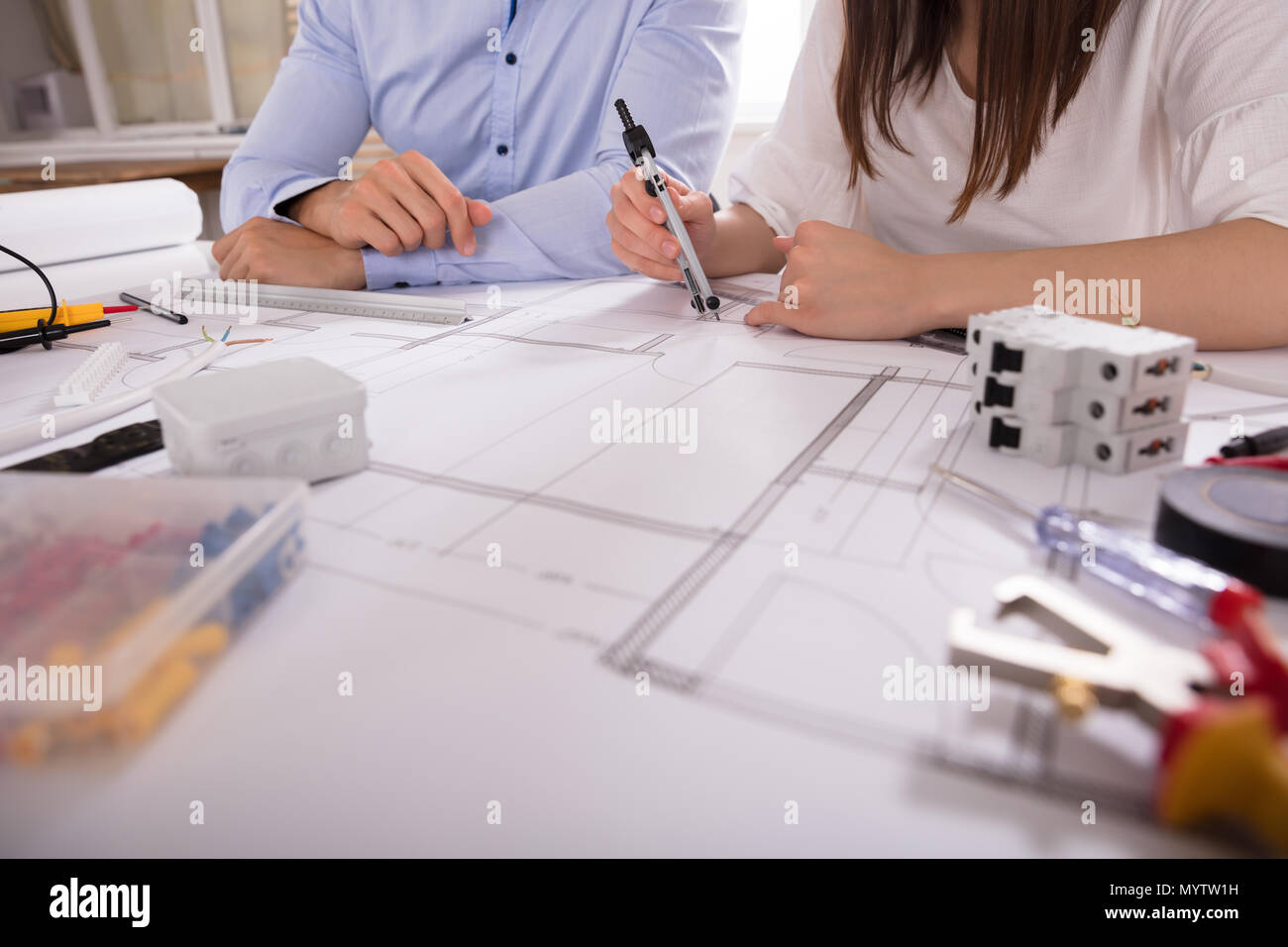 Two Architect Working With Work Tools Over Blueprint Stock Photo