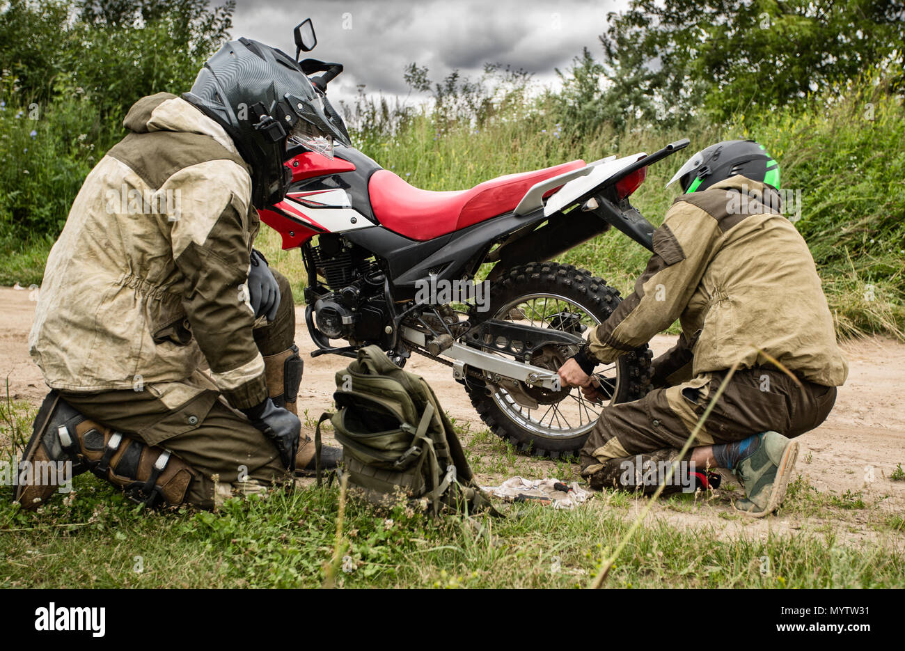 Motorcycle repair on the road Stock Photo Alamy