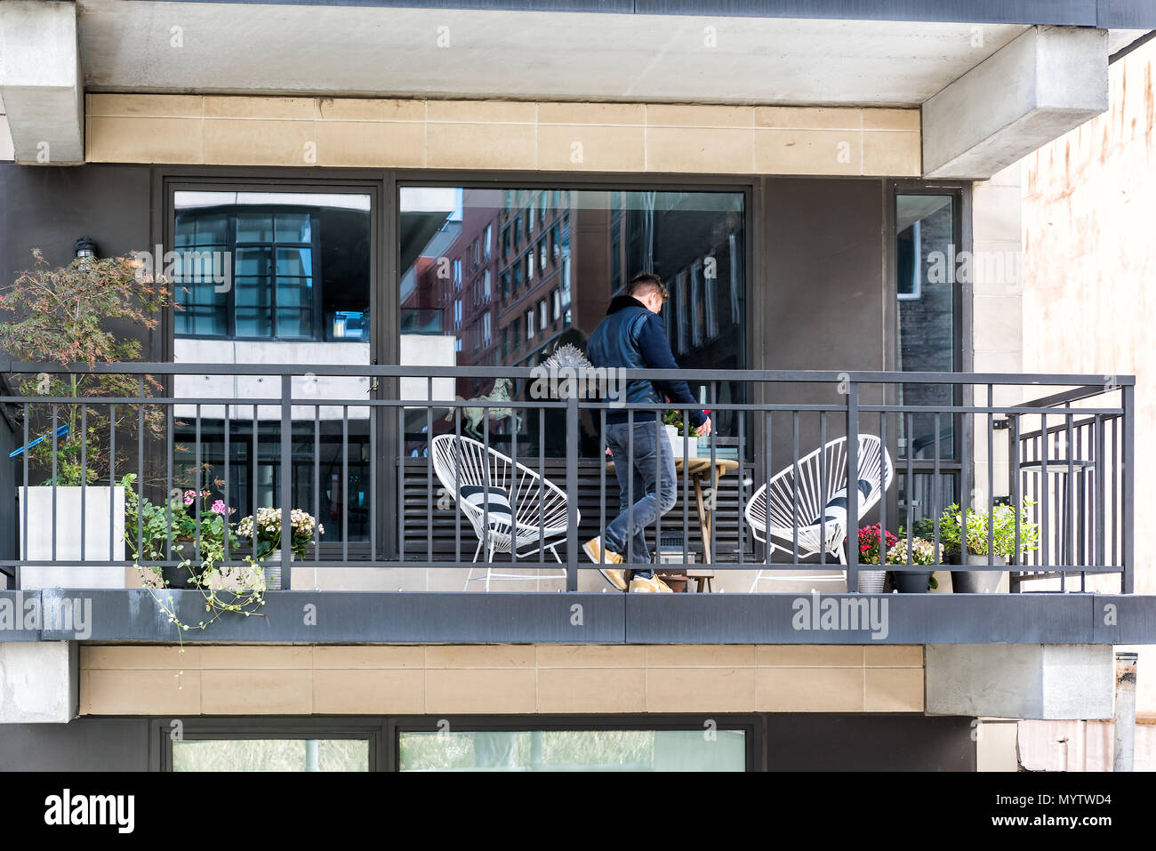 New York City, USA - October 30, 2017: View of balcony on highline in Chelsea neighborhood apartment condo modern rent rental building in midtown Manh Stock Photo
