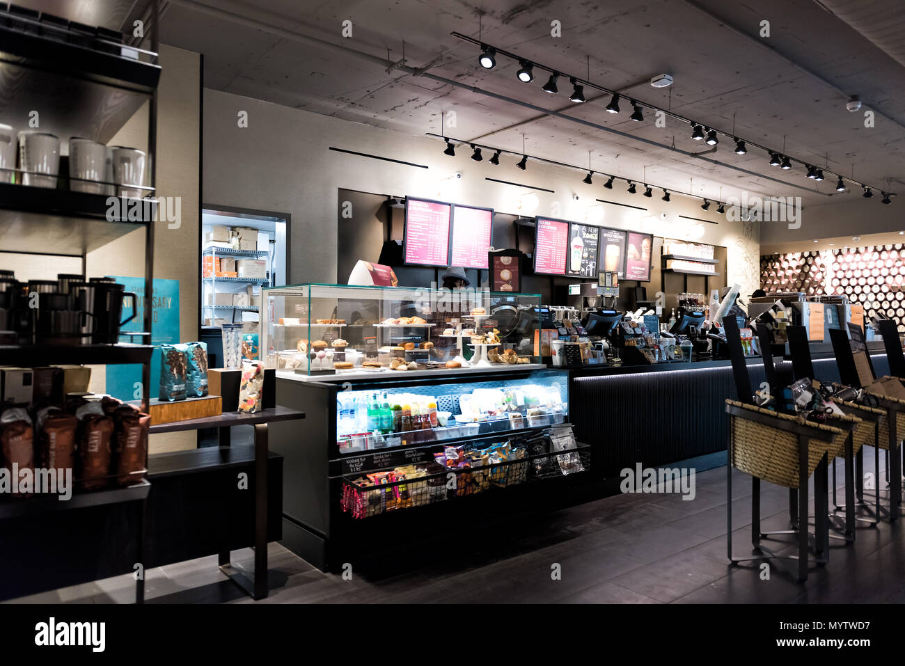 New York City, USA - October 30, 2017: Inside Starbucks store in midtown Manhattan NYC NY with menu, order counter selection of food, coffee in cafe Stock Photo