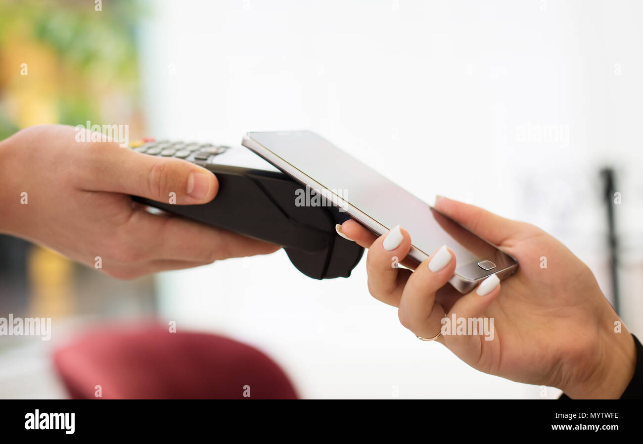 NFC Near field communication, mobile payment Stock Photo Alamy